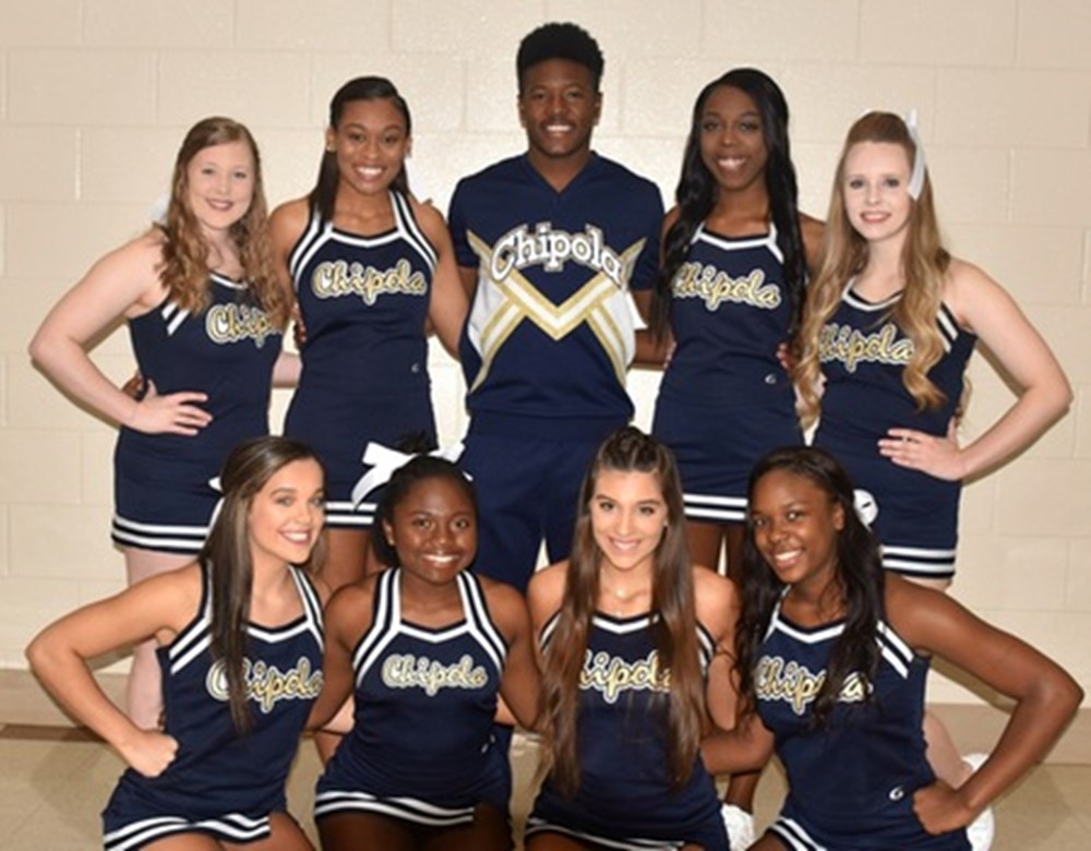 Cheerleaders posing for picture