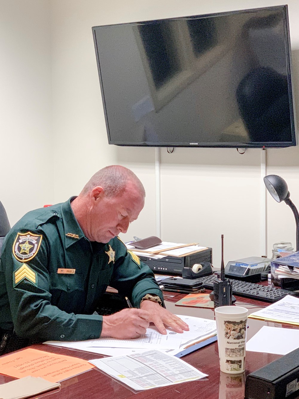 Police officer at his desk